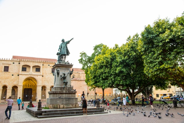 People near a monument in the capital of the Dominican Republic.