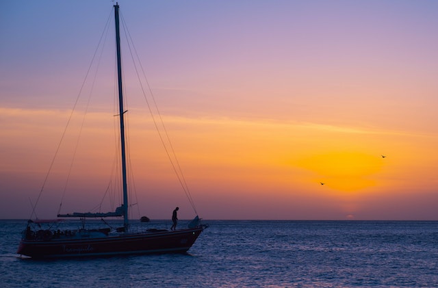 People on a boat watching the sunset while on vacation in Aruba this winter.