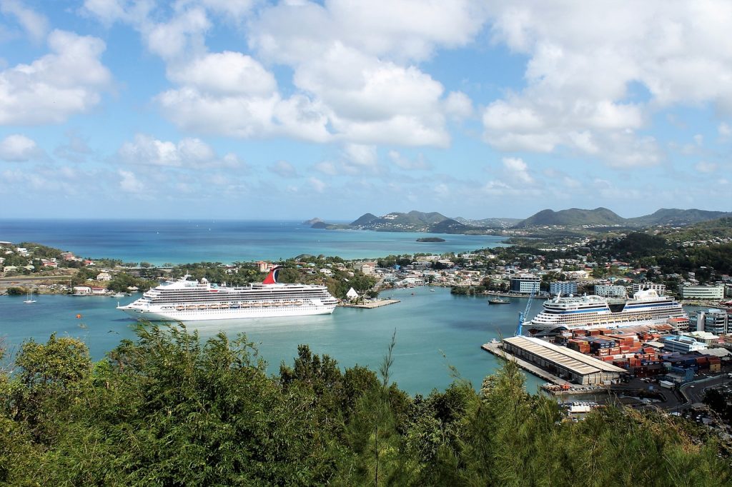 Large cruisers anchored in port with people vacationing in Aruba this winter
