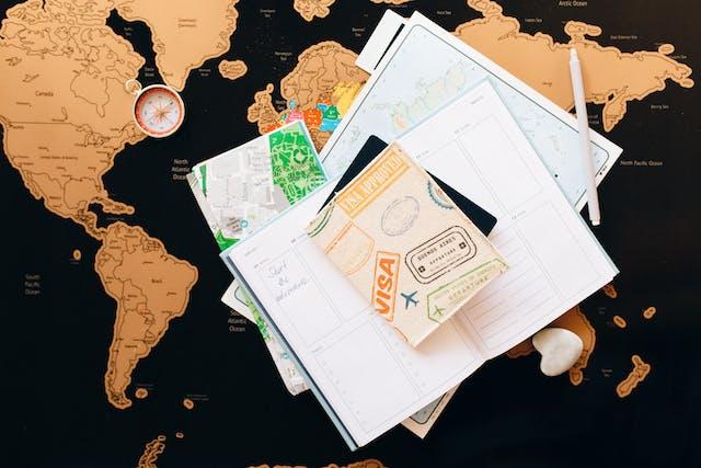 Travel documents on the map of the world. For moving from house to island home.