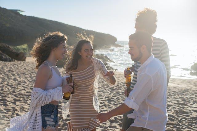 A group of young people are having fun on a Caribbean beach 